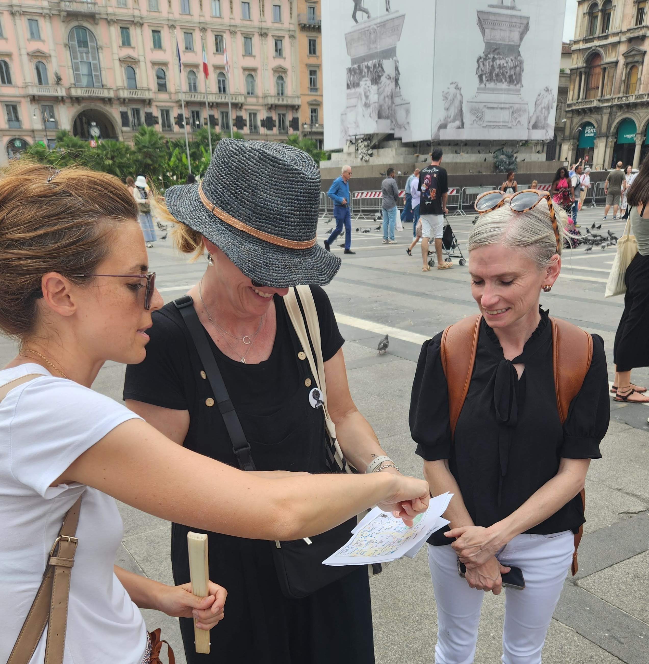 Italian instructor giving pointers to Virginia Tech professors while visiting Milan
